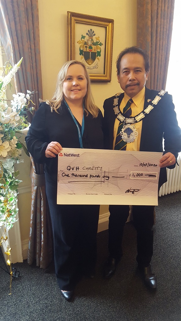 East Grinstead Mayor Danny Favor presents cheque from The Spitfire Society to QVH Charity on 10 March 2020.